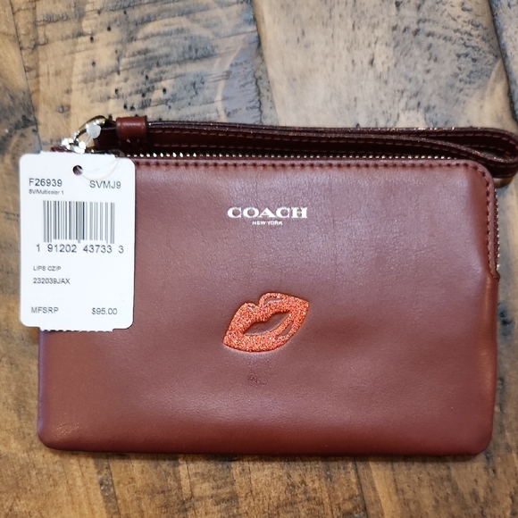 Coach Handbags - NWT Authentic Coach Burgundy Brown Wristlet with Red Lips Detail